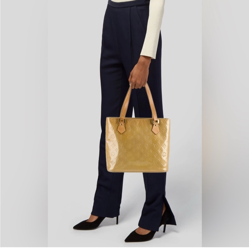 Loui Vuitton  mustard color tote bag. Brown leather straps Excellent condition